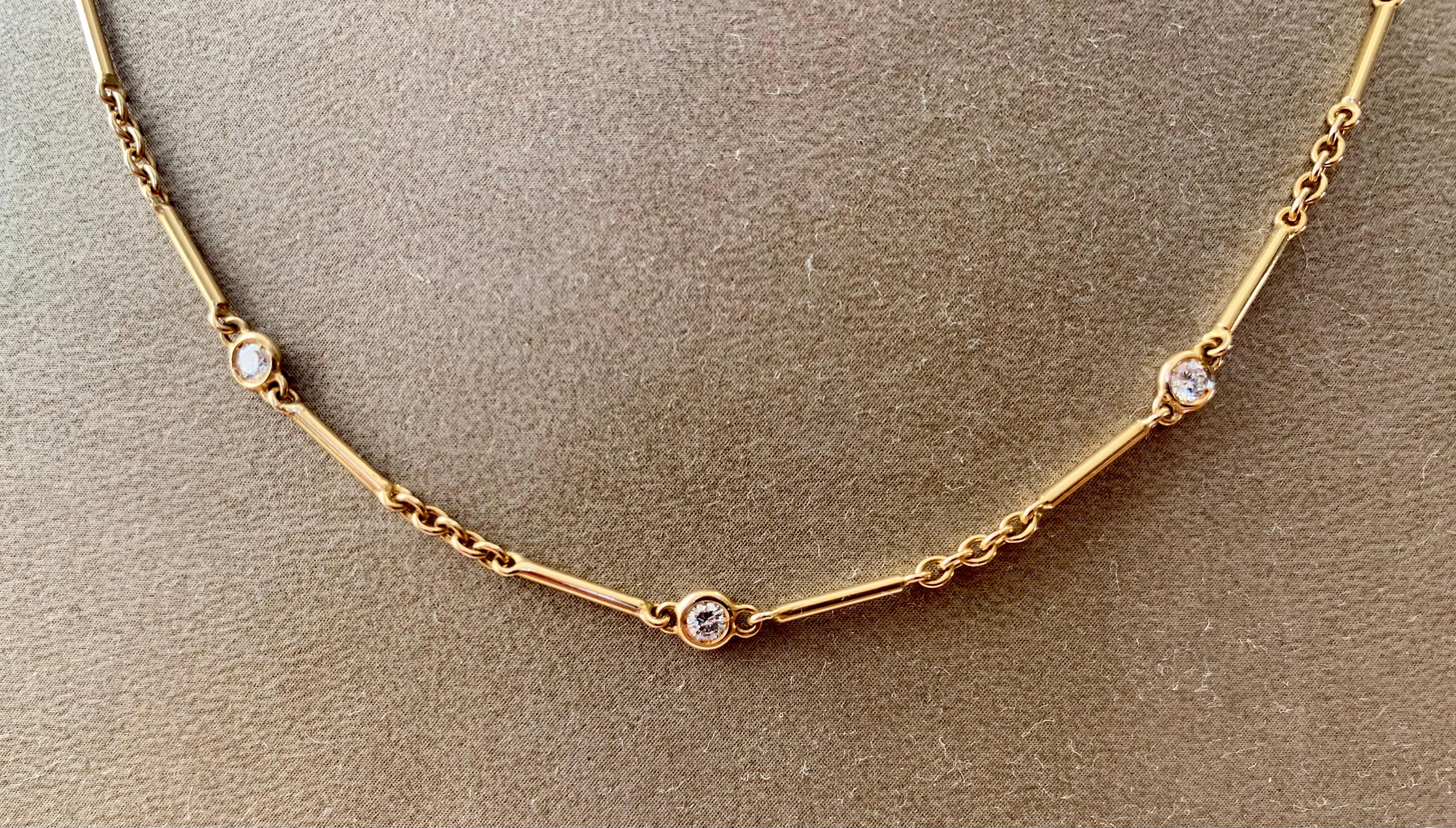 18 K yellow Gold Diamants Légers Diamond By The Yard Choker Necklace by Cartier. With 11 round brilliant cut diamonds  weighing approximately 1 ct, G color, VVS1 clarity. Stamped hallmarks and serial number 219725
Length: 39 cm.
Masterfully