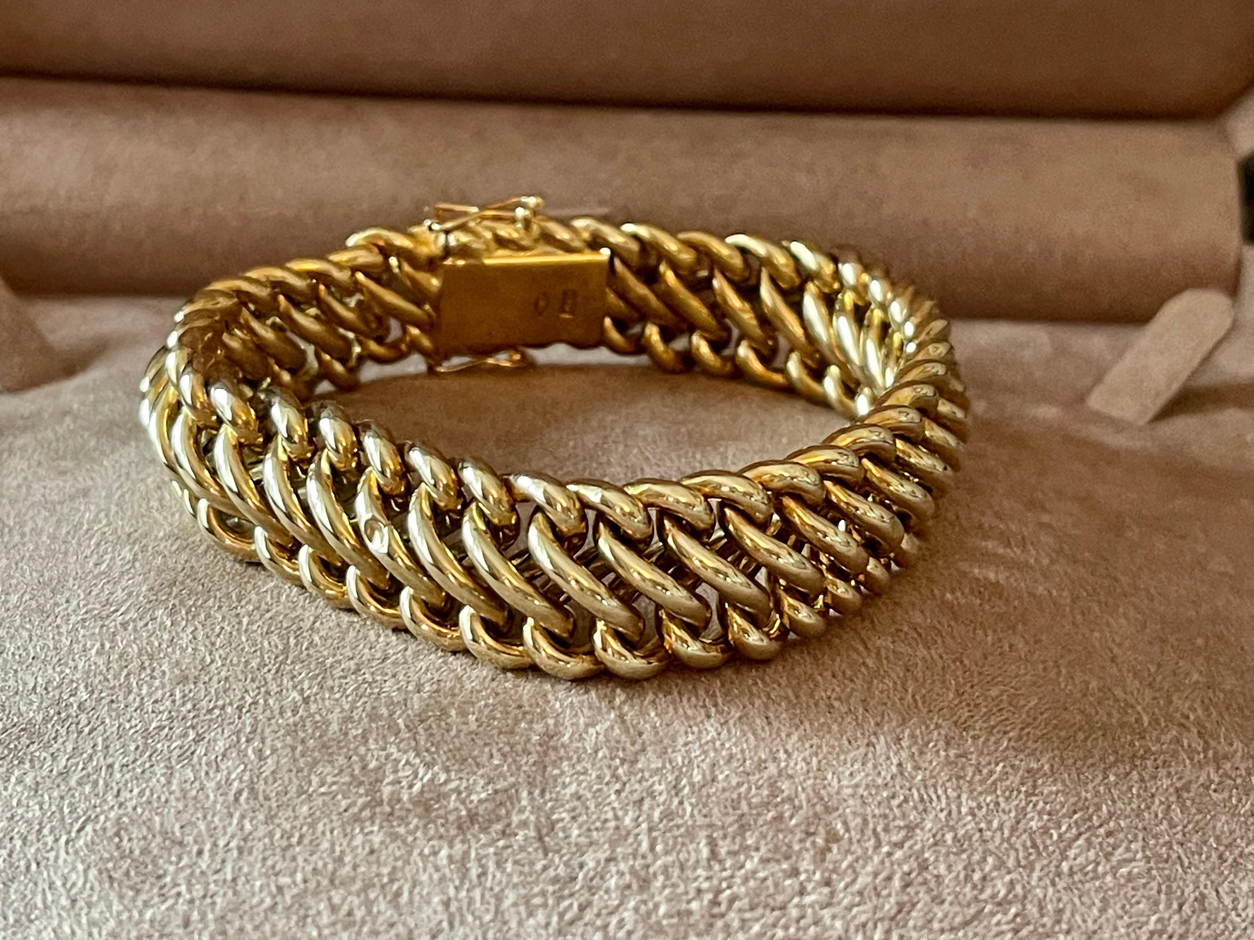 A timeless 18 K Vintage Bracelet. This circa 1950's chain bracelet gives an upgrade to the normal gold chain bracelet in your drawer. 
Length: 20 cm. Width: 1.70 cm  Weight: 35.89 grams. 
QUESTIONS?  Contact us right away if you have additional