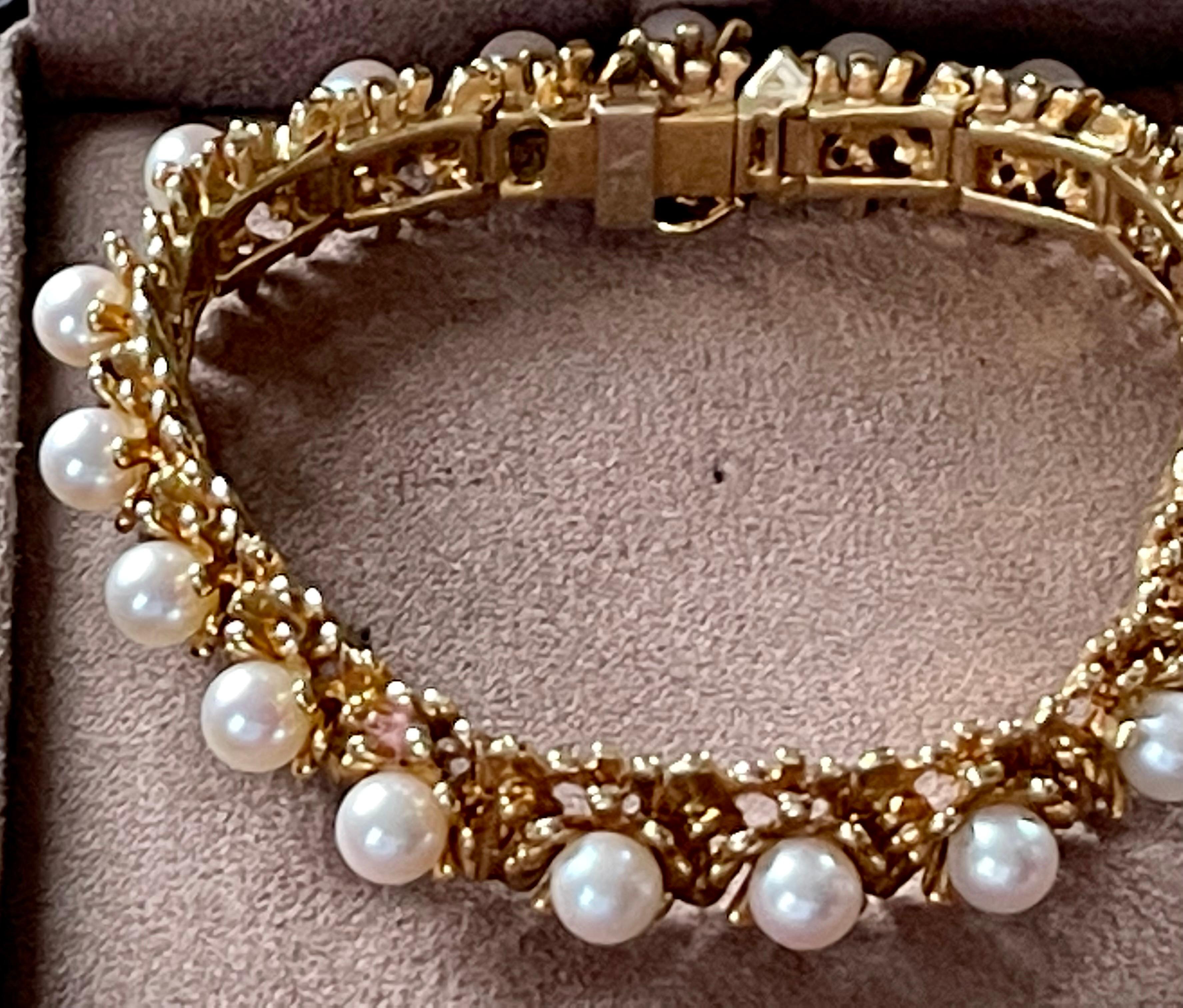 A unique handmade bracelet in 18 K yellow Gold from the 1960s featuring 19 fine Akoya cultured Pearls with a Diameter of ca. 5.8mm. 
The bracelet measures 1.22 cm in width and is 18.5 cm long. Very solid workmanship. it weighs 56.80