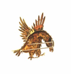 18 Karat Yellow Gold, White Enamel, Rubi and Diamond Eagle Brooch