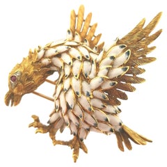 18 Karat Yellow Gold, White Enamel, Rubi and Diamond Eagle Brooch