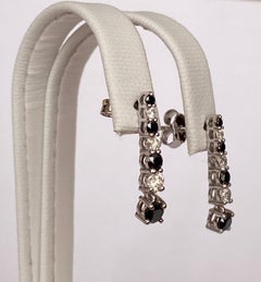 18 Karat White Gold Dangle Ear Studs with White and Black Diamonds