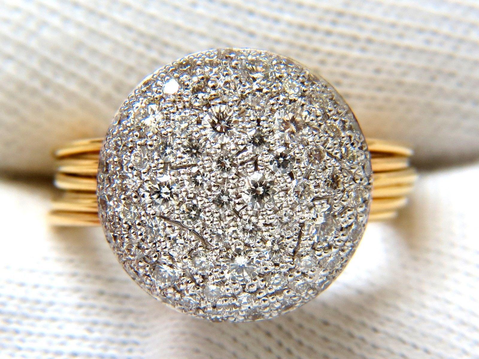 Modern Deco / Multi Band Gorgeous. 

1.36ct diamonds

Round Full cuts

Bead set

G color, Vs-2 clarity

18kt. white & Yellow gold

8.8 Grams

Ring is .60 Inch wide 

.26 Inch depth

current size: 7.25

We may not resize

Completely hand made with