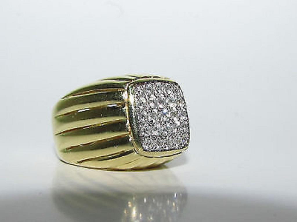 Unique Modified Modern Deco Dome ring

1.50ct. diamonds, French pave set by hand

G-H-color, Vs-1 Vs-2 clarity.

18kt. yellow gold

11.75mm (at diamond box)

22mm (shoulder to shoulder)

9mm (skin of finger to top of ring)

19.6 grams

Size