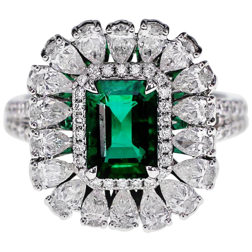 18 Karat 1.55 Carat Vivid Green Emerald and Diamond Solitaire Ring