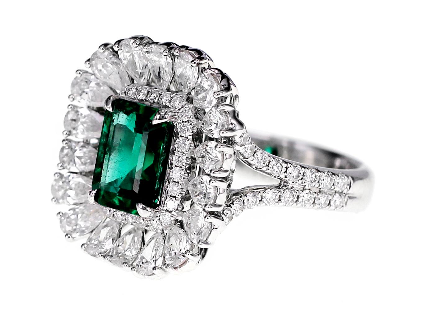  A lovely vivid green 1.55 carat Emerald is set along with 1.85 carat of white brilliant natural diamond. The details are as follows:
Color: F
Clarity: VS 1
Ring Size : US 6.5