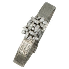 18 Karat 1950s Omega Double Marquis Diamond Set Flower Concealed Bracelet Watch