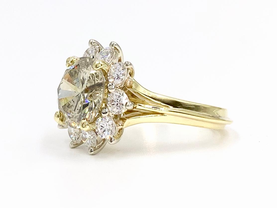 Women's 18 Karat 4.01 Carat Total Weight Diamond Vintage Halo Ring For Sale