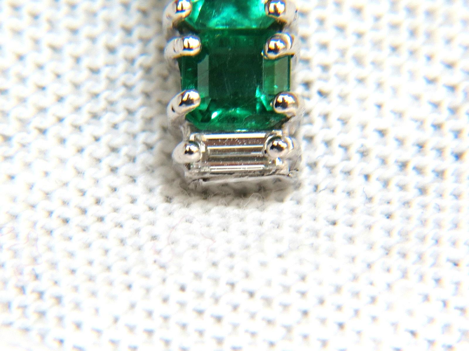 emerald cross pendant