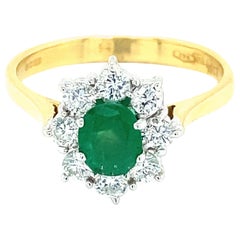 18 Karat .54 Carat Emerald and Diamond Ring