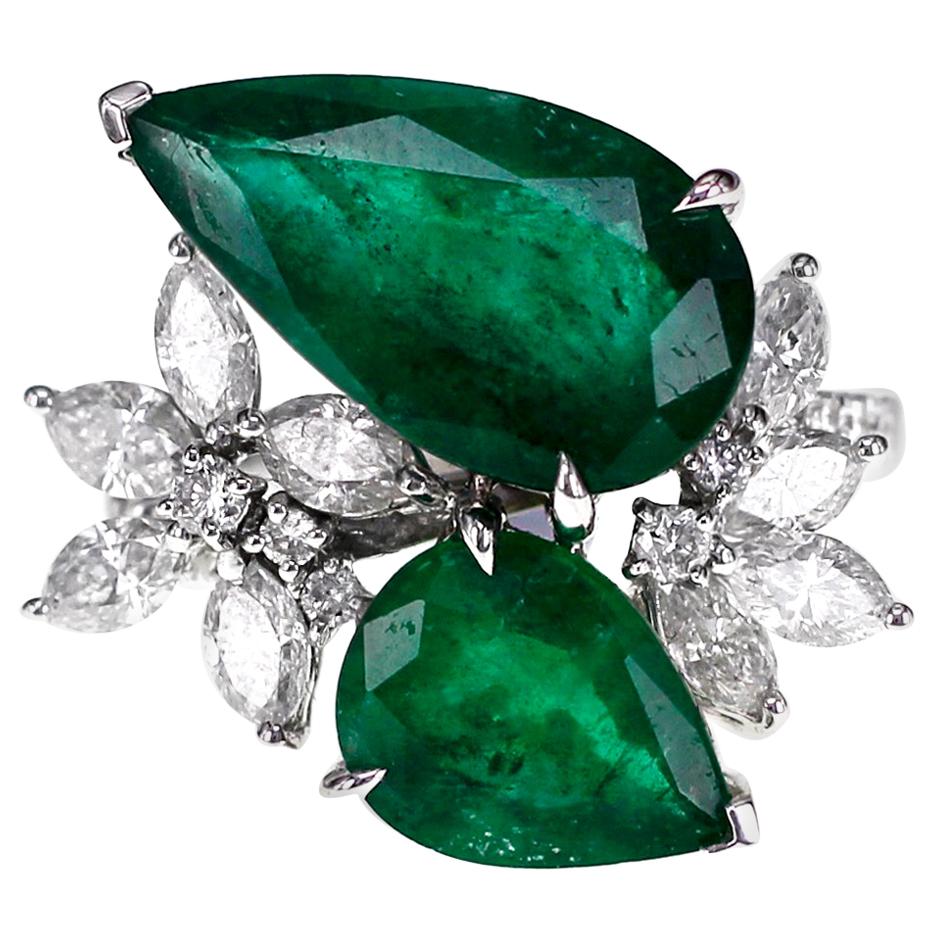 18 Karat 6.67 Carat Soothing Green Emerald and 1.35 Carat Diamond Ring