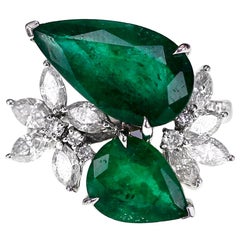 18 Karat 6,67 Karat beruhigender grüner Smaragd und 1,35 Karat Diamantring