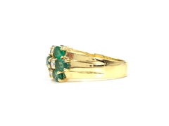 18 Karat Alternating Emerald and Diamond Wide Ring