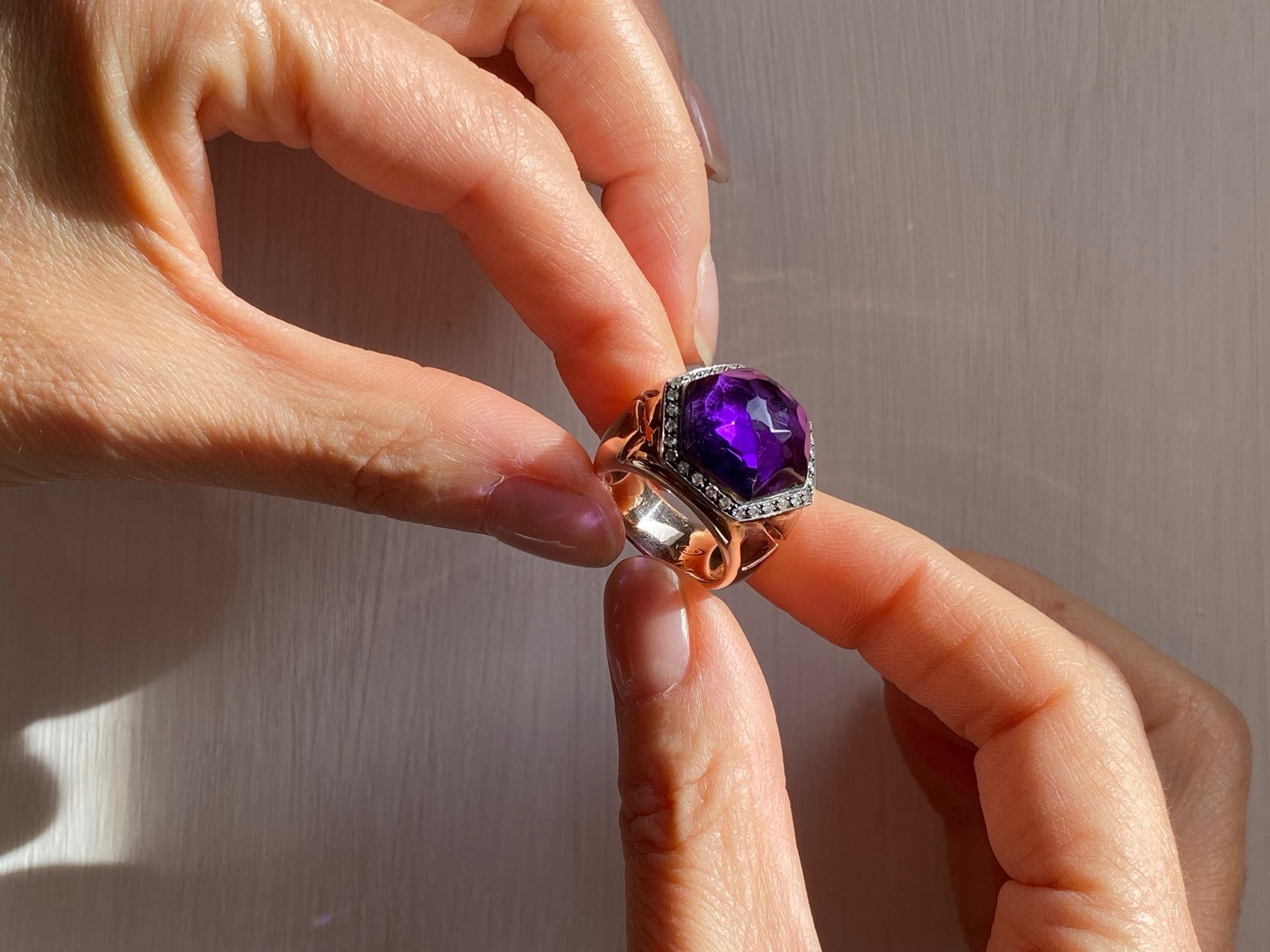 Here there is a beautiful design ring handcrafted in 18 karats rose gold and embellished with 0.40 karats brilliant cut white diamonds and a deep purple amethyst stone. 
Available size 6.25 (Italian size 13), other sizes available in two weeks by