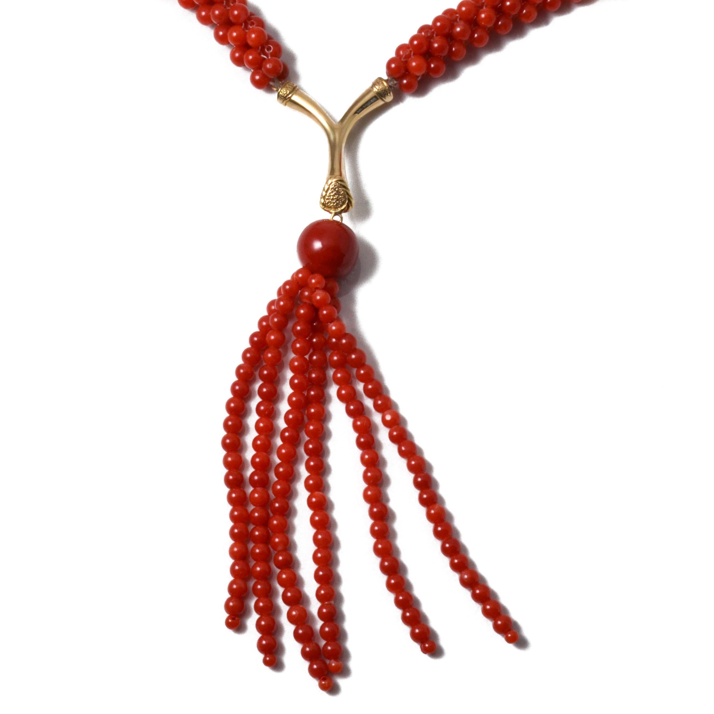 This luxurious vintage necklace was made over 50 years ago. The majority of the beads in this long necklace are a deep Chiaka Sango (oxblood) with a few being a lighter red.
This piece is approximately 2.5mm long. The red coral beads are handwoven