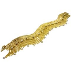 18 Karat and Diamond Retro Bracelet, circa 1950