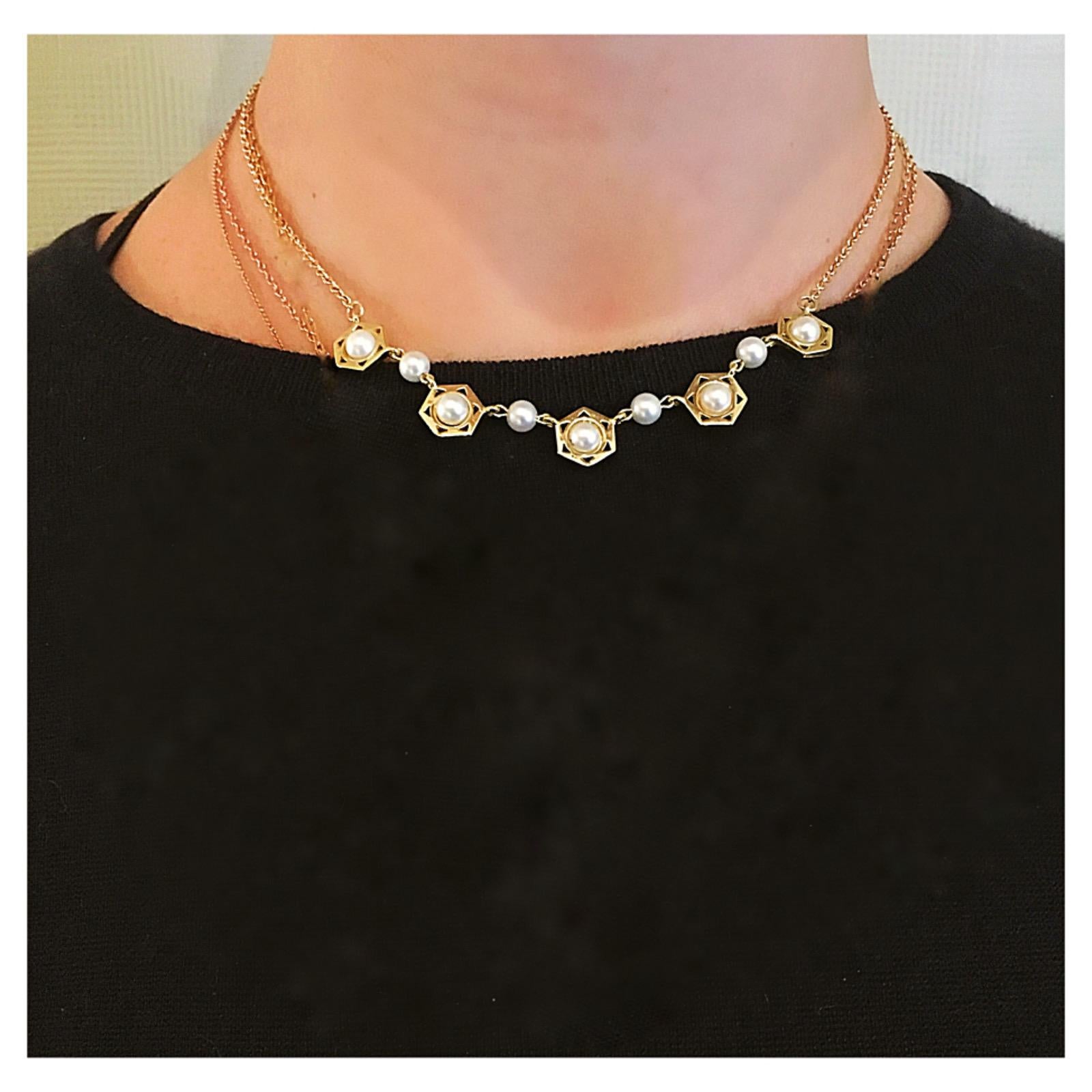 A classic with a twist, this pearl and 18 karat gold necklace is a new way to incorporate pearls into your wardrobe.  There is a modern, geometric feel to this design with hexagon motifs surrounding white pearls.  The 18k chain is finished with our