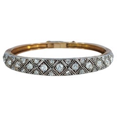 18 Karat and Platinum Bangle with Old Cut Diamonds, with a Very Secure Lock