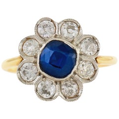 18 Karat and Platinum Flower with Sapphire and Diamonds Ring