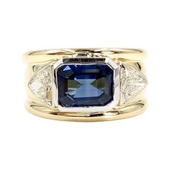 18 Karat and Platinum Three-Stone Blue Sapphire and Diamond Wide Ring