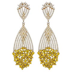 18 Karat Apus Yellow Gold Earring With Vs-Gh Diamonds And Yellow Sapphire