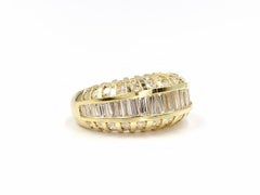18 Karat Baguette and Round Diamond Low Dome Ring