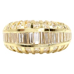 Vintage 18 Karat Baguette and Round Diamond Low Dome Ring