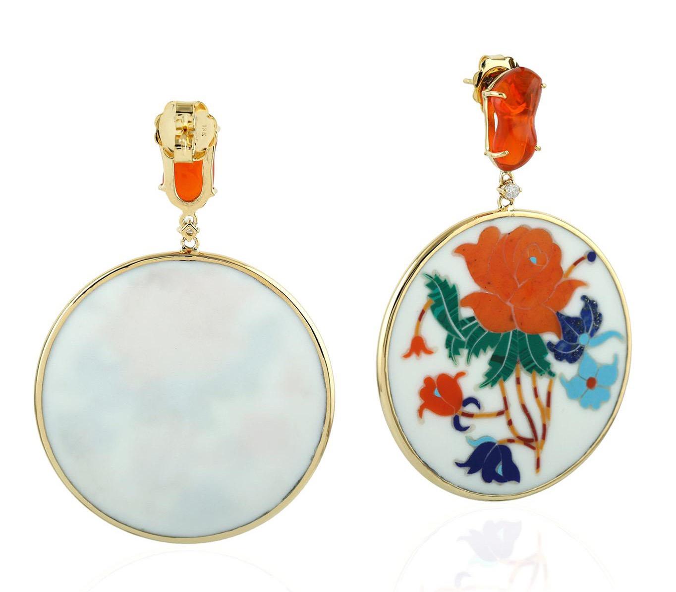 These beautiful Fire Opal Inlay earrings features unique hand painted miniature art set with 18K gold.  It is set with 6.5 carats of fire opal & 0.11 carats diamonds.

FOLLOW  MEGHNA JEWELS storefront to view the latest collection & exclusive