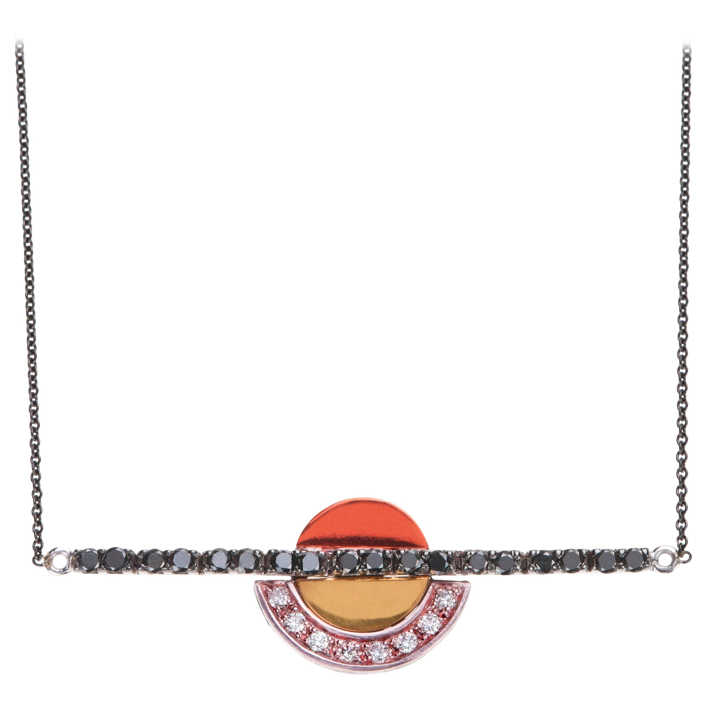 18 Karat Black Gold Pendant with Black and White Diamonds For Sale