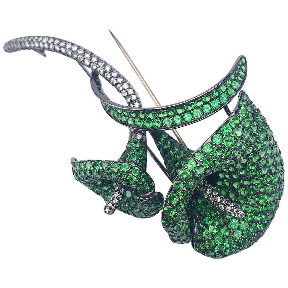 18 Karat Blackened Gold Calla Lily Brooch with Diamonds and Green Garnets For Sale