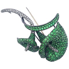 18 Karat Blackened Gold Calla Lily Brooch with Diamonds and Green Garnets