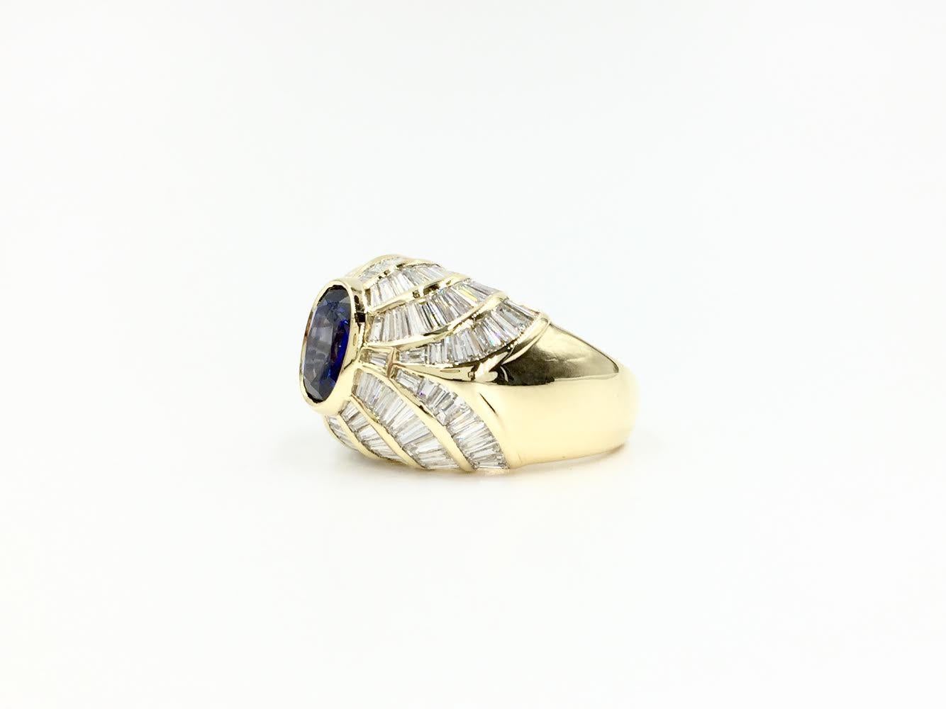 Art Deco 18 Karat Blue Sapphire and Baguette Diamond Cocktail Ring For Sale