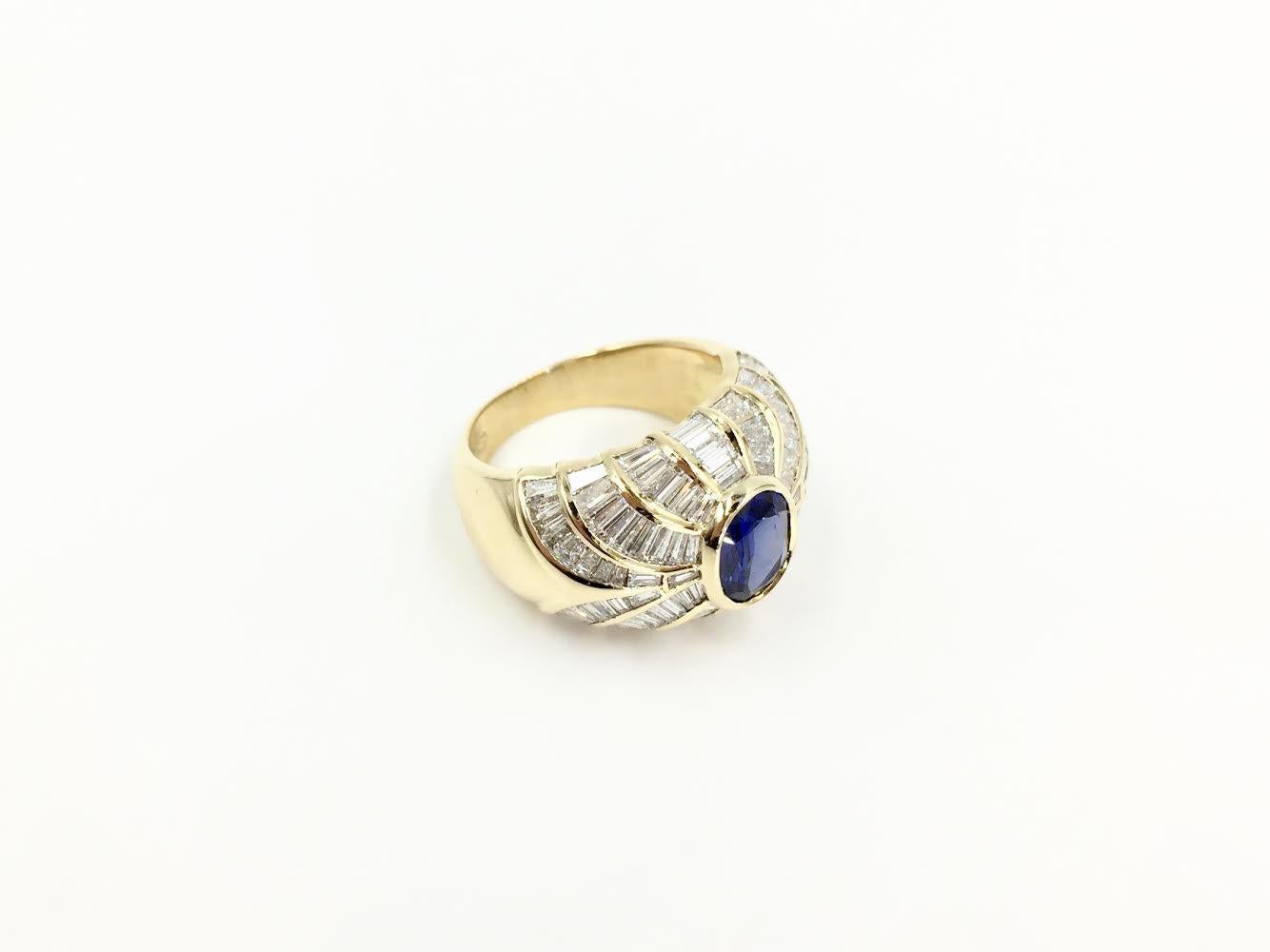 18 Karat Blue Sapphire and Baguette Diamond Cocktail Ring In Excellent Condition For Sale In Pikesville, MD