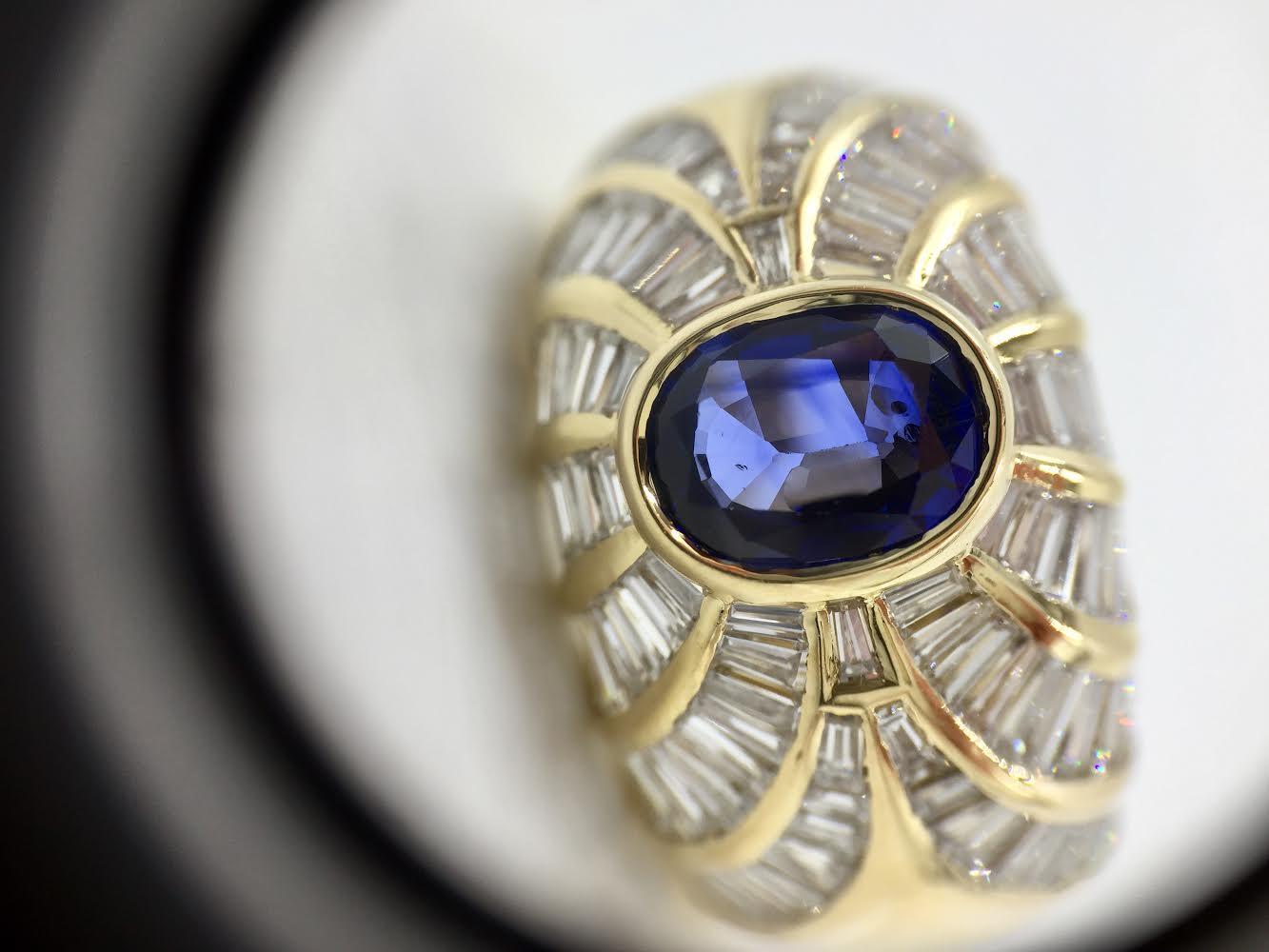Women's 18 Karat Blue Sapphire and Baguette Diamond Cocktail Ring For Sale