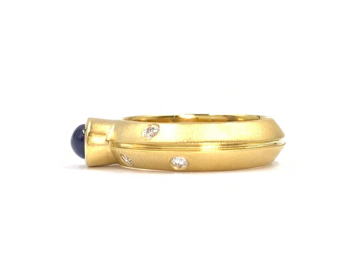 Modern 18 Karat Blue Sapphire and Diamond Ring