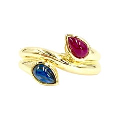 18 Karat Blue Sapphire and Ruby Moi Et Toi Bypass Ring