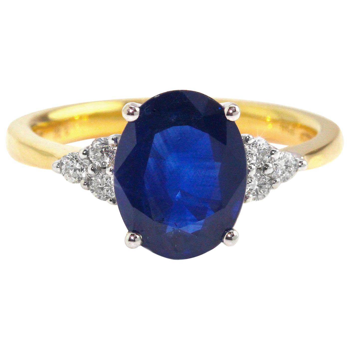 18 Karat Blue Sapphire Diamond Ring For Sale