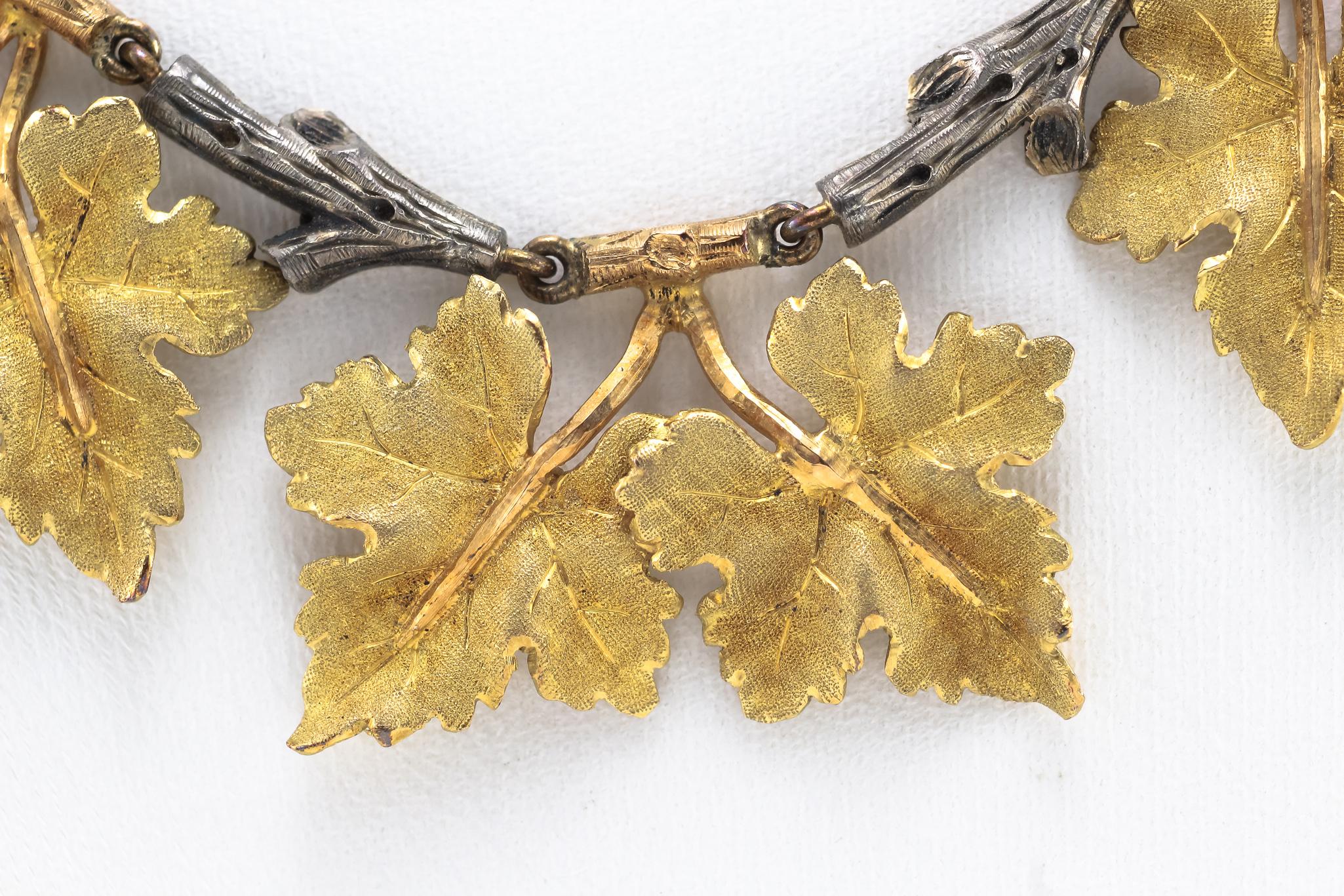 A Genuine M. Buccellati Necklace that features The Quintessential Grape Leaf Motif.  Masterfully crafted from Solid 18 Karat Yellow and White Gold, this exceptional piece features both Buccellati's highly specialized engraving techniques and his