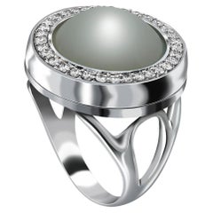 18 Karat Chameleon White Gold Ring with Vs-Gh Diamonds