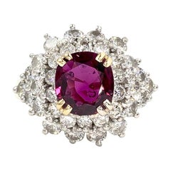 18 Karat Cushion Ruby and Diamond Cluster Ring