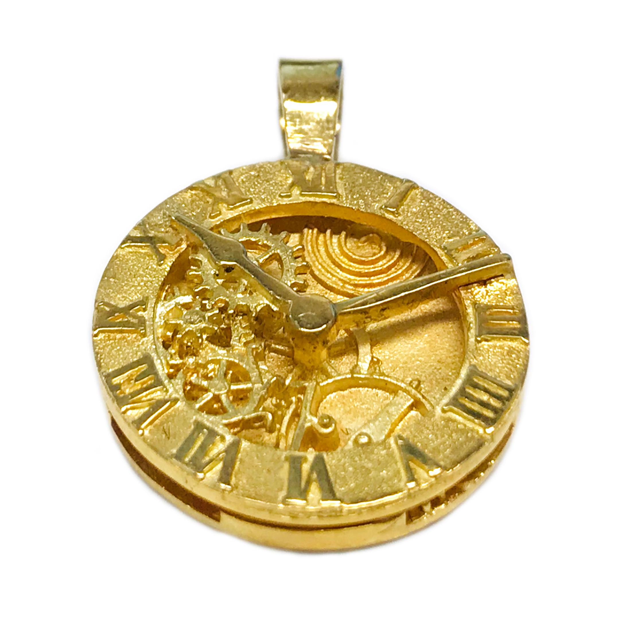 18 Karat Custom Clock Pendant. This is a custom stunning one-of-a-kind pendant. The clock has multi-layers of meticulous detail in smooth and stone finishes. The circle pendant measures 20mm in diameter. Engraved on the back is 18k JBG. The total