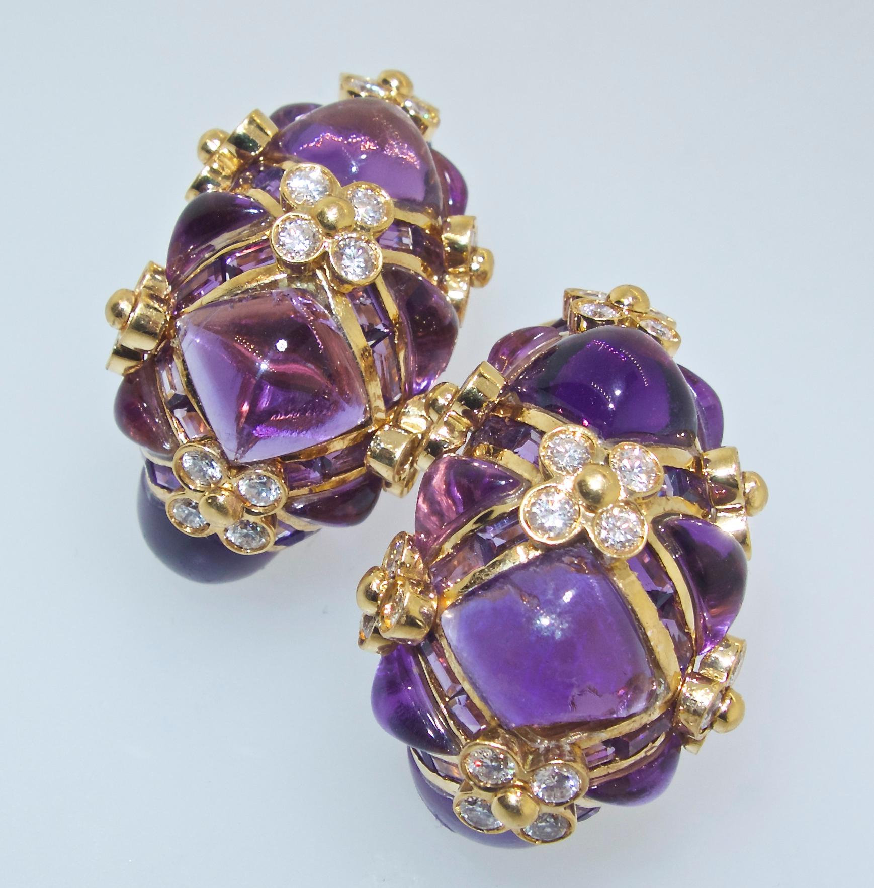Amethyst 18K gold and fine white diamond earring.  The 48 diamonds are all near colorless H and very slightly included.  These diamonds total 1.40 cts.  The bright purple amethysts are a fancy cabachon cut and caliber cut.  These earrings are just