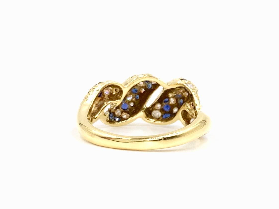 18 Karat Diamond and Blue Sapphire Twisted Ring In Excellent Condition For Sale In Pikesville, MD