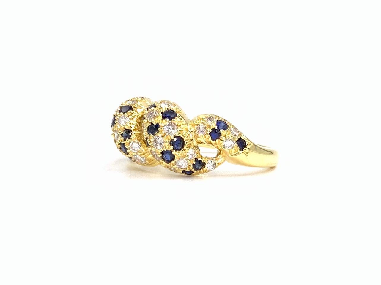 18 Karat Diamond and Blue Sapphire Twisted Ring For Sale 1