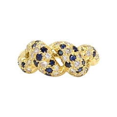 18 Karat Diamond and Blue Sapphire Twisted Ring