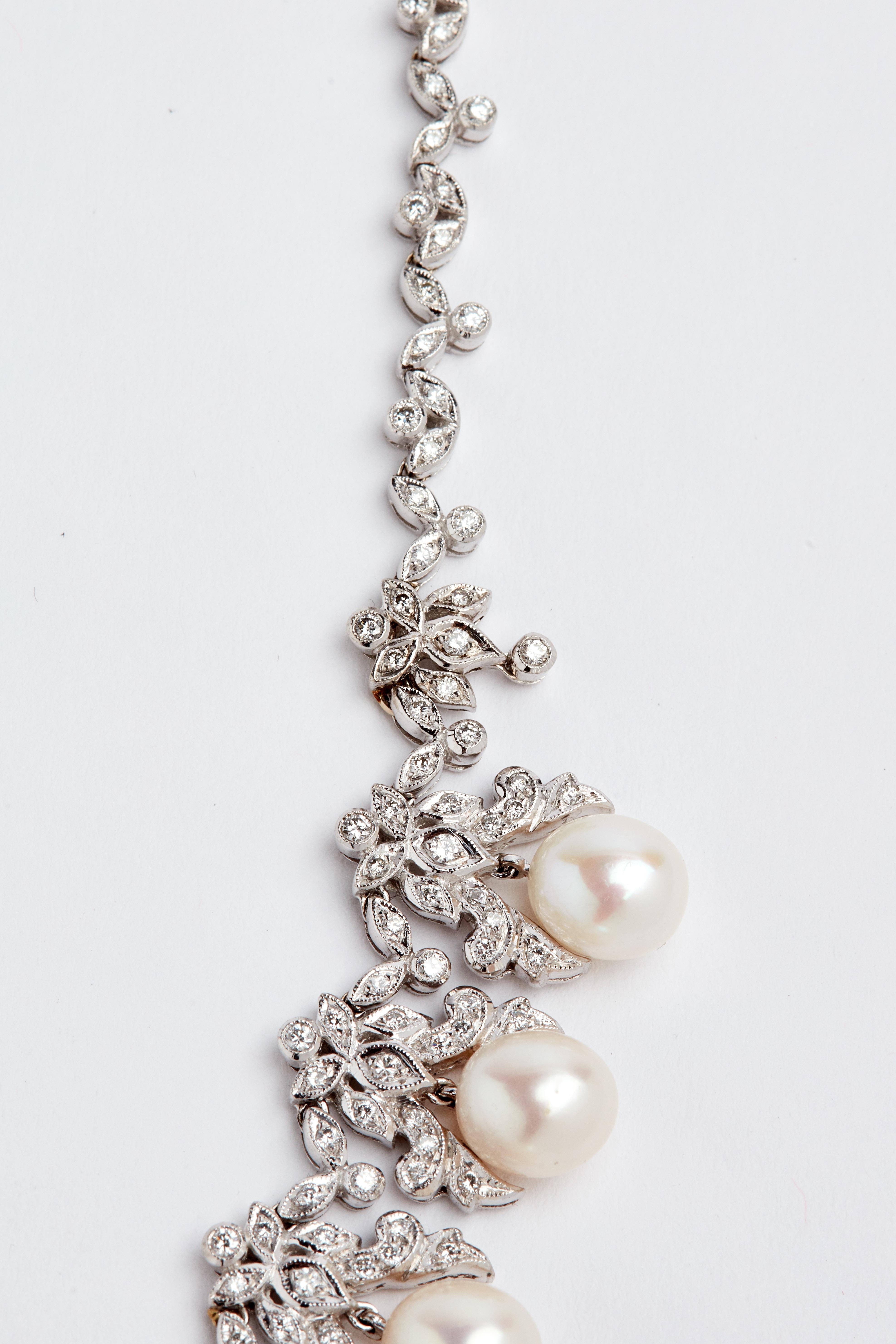 18K Diamond and Cultured Pearl Necklace. Diamonds weighing aprox 3.75 carats. 16 1/4 inch length. 