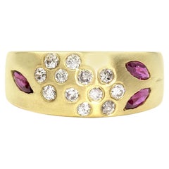 18 Karat Diamond and Ruby Flower Ring 18 Karat Diamond and Ruby Flower Ring