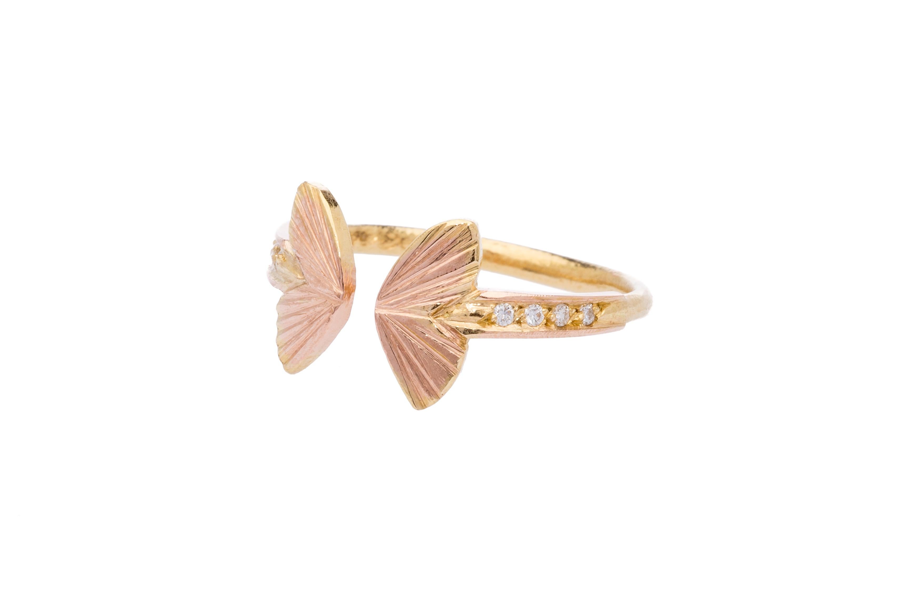James Banks's signature butterfly ring features two Baby Asterope butterfly wings with space in between, set in 14k Rose Gold and set on a solid 18k Yellow Gold band with white diamond pave 
14k Rose Gold, 18k Yellow Gold, White Diamonds 
Handmade