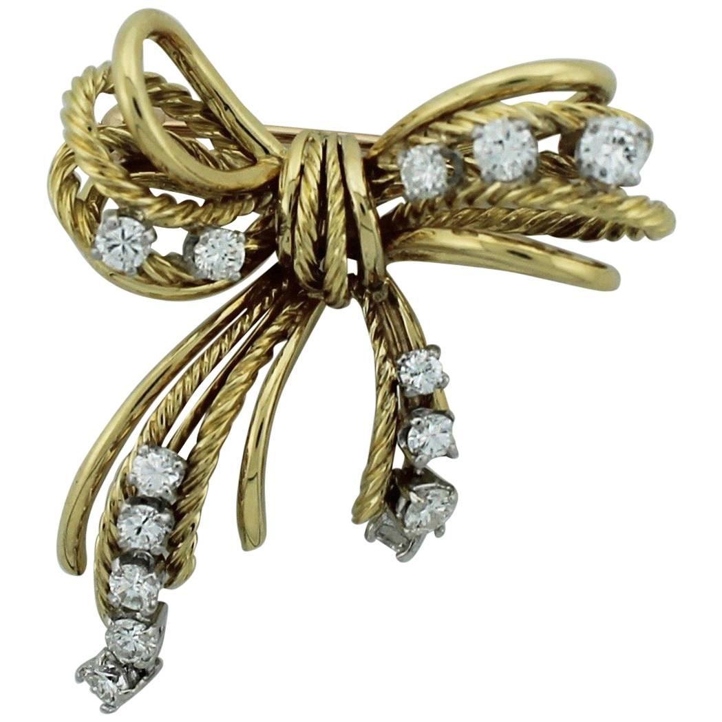 Spilla a fiocco con diamante 18 carati, anni '50 circa