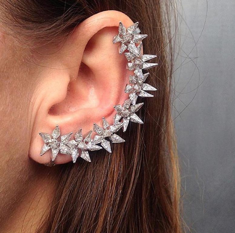Diamond Eclipse Spike Ear Cuff features Karma El Khalil's signature geometric spike hedgehog motif shaped in a linear pattern to frame the edge of the ear set in 18k White Gold with pave white diamonds
Includes two 18k White Gold ear clips to secure
